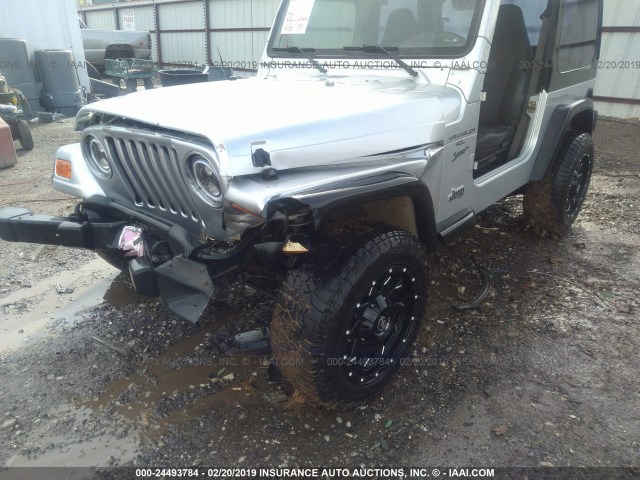 1J4FA49S4YP711751 - 2000 JEEP WRANGLER / TJ SPORT SILVER photo 6