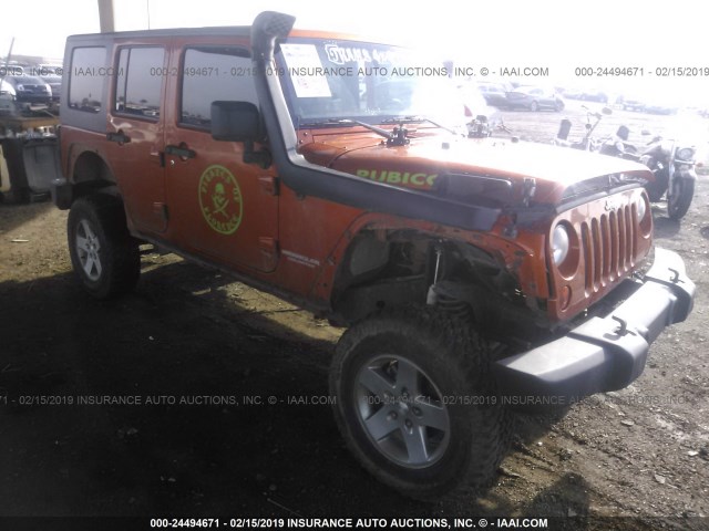 1J4BA6H19BL634120 - 2011 JEEP WRANGLER UNLIMITE RUBICON ORANGE photo 1