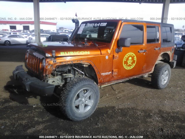 1J4BA6H19BL634120 - 2011 JEEP WRANGLER UNLIMITE RUBICON ORANGE photo 2