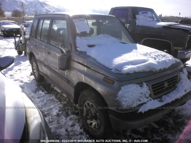 2S3TD03V7S6409472 - 1995 SUZUKI SIDEKICK JX/JLX SILVER photo 1