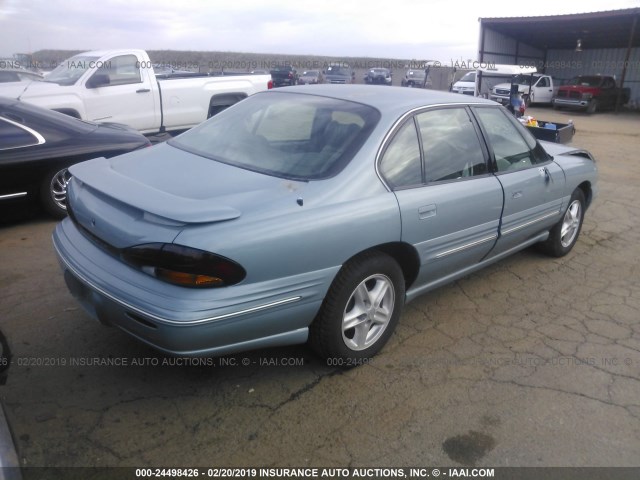 1G2HX52K6VH222288 - 1997 PONTIAC BONNEVILLE SE BLUE photo 4