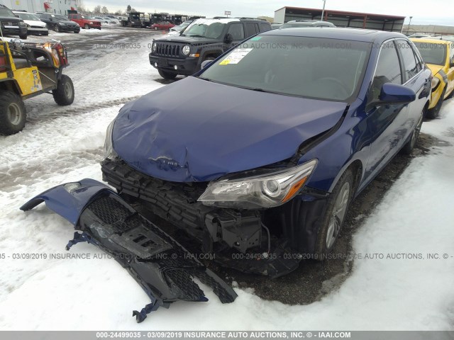 4T1BF1FKXGU530044 - 2016 TOYOTA CAMRY LE/XLE/SE/XSE ლურჯი ფოტო 4