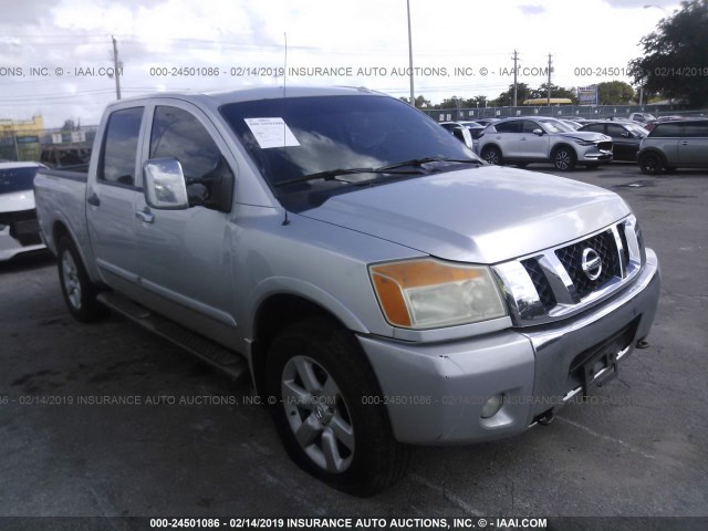 1N6AA07C29N302906 - 2009 NISSAN TITAN XE/SE/LE/PRO-4X SILVER photo 1