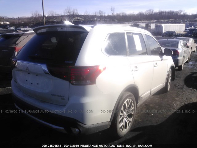 JA4AZ3A3XJZ068947 - 2018 MITSUBISHI OUTLANDER SE/SEL WHITE photo 4