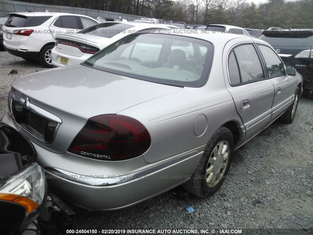 1LNHM97V62Y694433 - 2002 LINCOLN CONTINENTAL  Күміс фото 4