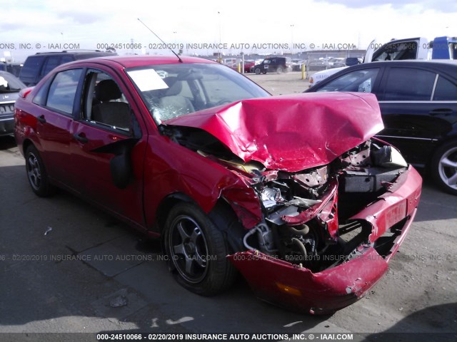 1FAFP34N95W249825 - 2005 FORD FOCUS ZX4 RED photo 1