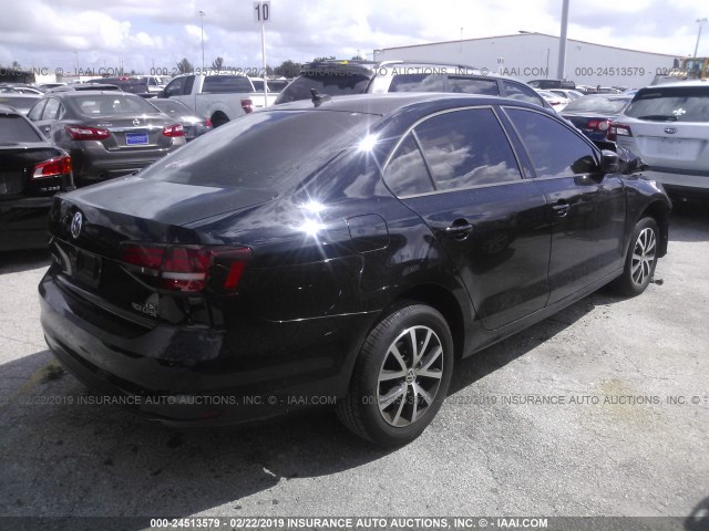 3VWD67AJ2GM414224 - 2016 VOLKSWAGEN JETTA SE BLACK photo 4