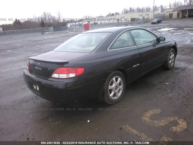 2T1CF28P0XC217069 - 1999 TOYOTA CAMRY SOLARA SE/SLE BLACK photo 4