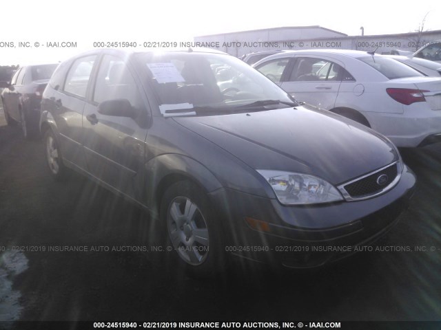 1FAHP37N97W331285 - 2007 FORD FOCUS ZX5/S/SE/SES GRAY photo 1
