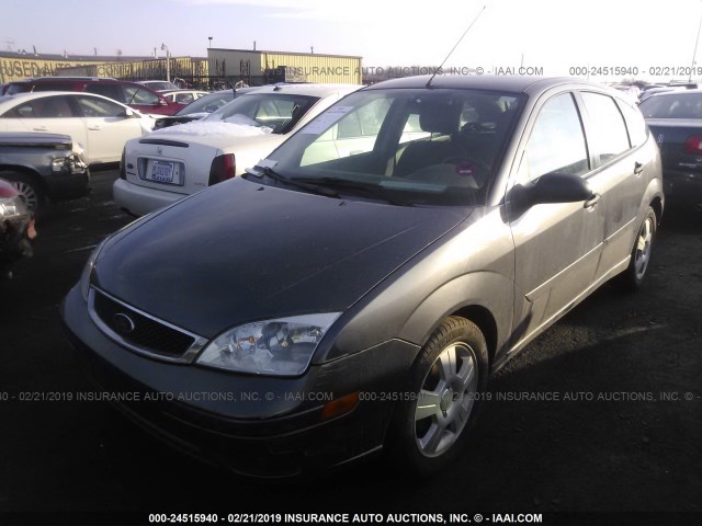 1FAHP37N97W331285 - 2007 FORD FOCUS ZX5/S/SE/SES GRAY photo 2