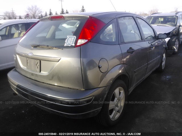 1FAHP37N97W331285 - 2007 FORD FOCUS ZX5/S/SE/SES GRAY photo 4