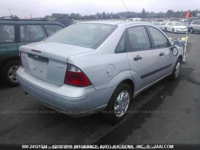 1FAFP34N05W109713 - 2005 FORD FOCUS ZX4 Unknown photo 4