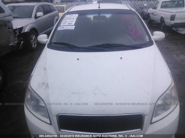 KL1TD66E49B601427 - 2009 CHEVROLET AVEO LS/LT თეთრი ფოტო 6