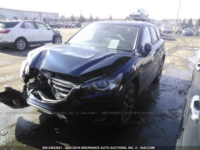 Jm3ke4dy3g 16 Mazda Cx 5 Gt Black Price History History Of Past Auctions Prices And Bids History Of Salvage And Used Vehicles