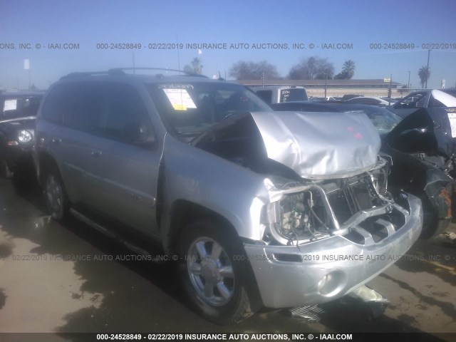 1GKDS13S452331274 - 2005 GMC ENVOY SILVER photo 1