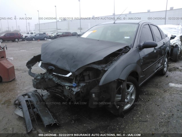 1FAFP34N45W232267 - 2005 FORD FOCUS ZX4 GRAY photo 2