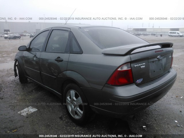 1FAFP34N45W232267 - 2005 FORD FOCUS ZX4 GRAY photo 3