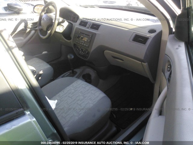 1FAFP34N15W274413 - 2005 FORD FOCUS ZX4 GRAY photo 5
