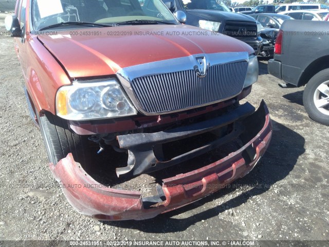 5LMRU27L0XLJ01600 - 1999 LINCOLN NAVIGATOR ORANGE photo 6