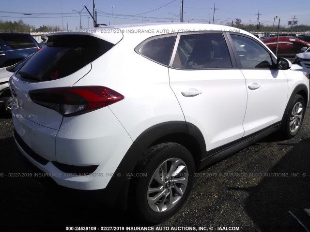 KM8J23A45GU023449 - 2016 HYUNDAI TUCSON SE WHITE photo 4