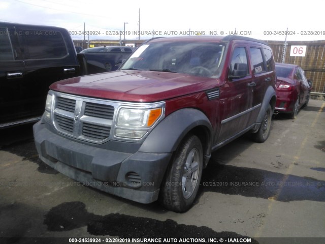 1D8GU28K97W740126 - 2007 DODGE NITRO SXT RED photo 2