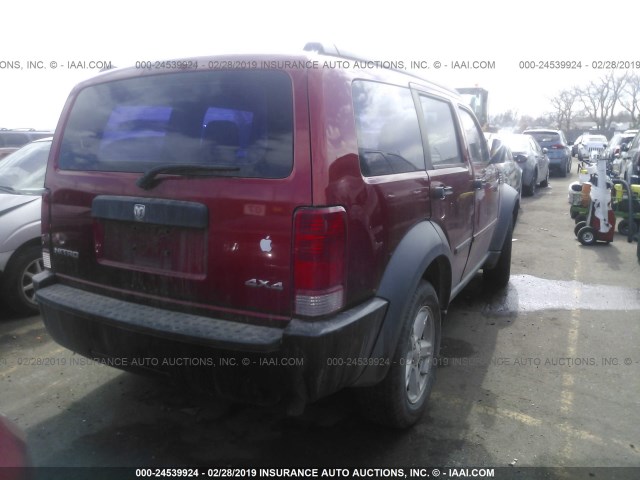 1D8GU28K97W740126 - 2007 DODGE NITRO SXT RED photo 4