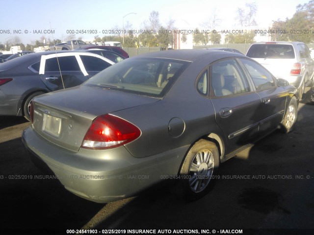 1FAFP56S74G130985 - 2004 FORD TAURUS SEL SILVER photo 4