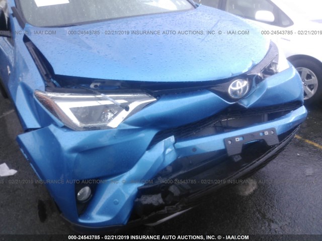 JTMJJREV9HD140014 - 2017 TOYOTA RAV4 HV SE BLUE photo 6