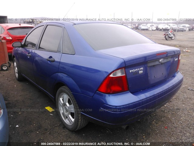 1FAFP34N95W135162 - 2005 FORD FOCUS ZX4 BLUE photo 3