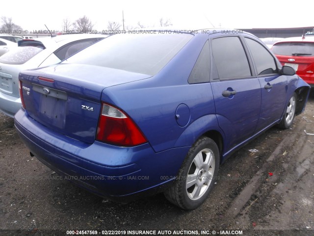 1FAFP34N95W135162 - 2005 FORD FOCUS ZX4 BLUE photo 4