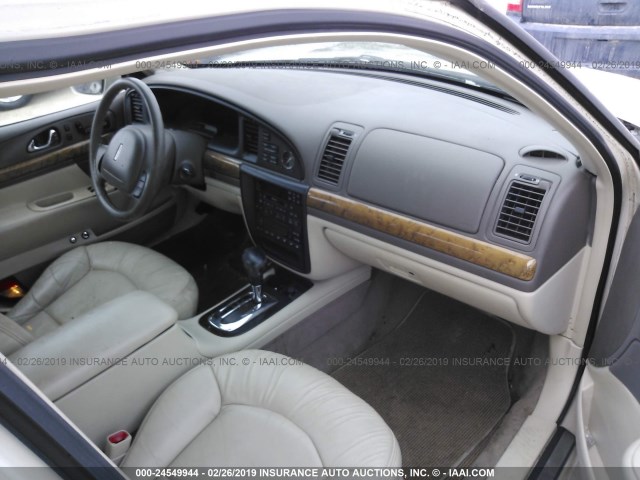 1LNHM97V6YY916803 - 2000 LINCOLN CONTINENTAL  CREAM photo 5