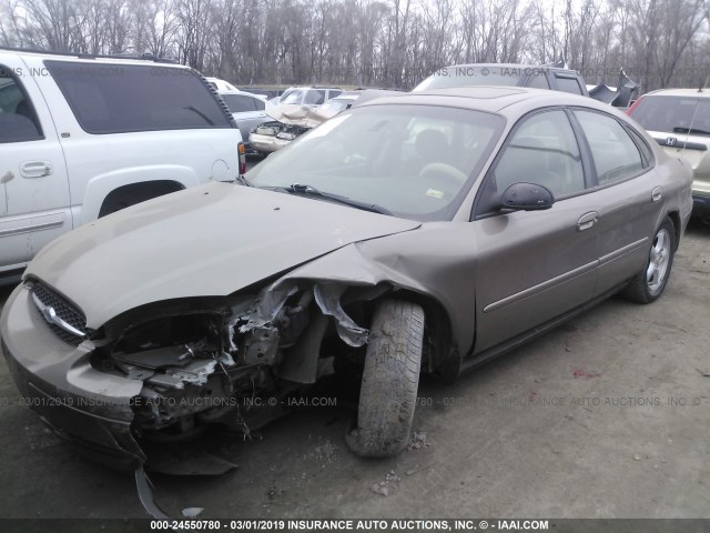 1FAFP55U02G207678 - 2002 FORD TAURUS SES TAN photo 2