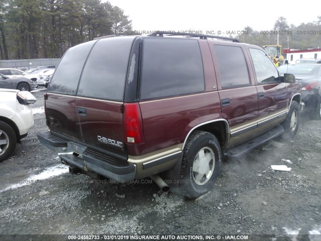 1GNEK13R1XJ387556 - 1999 CHEVROLET TAHOE K1500 RED photo 4