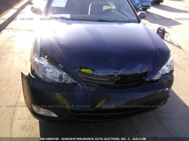 4T1BE30KX4U355815 - 2004 TOYOTA CAMRY LE/XLE/SE BLACK photo 6