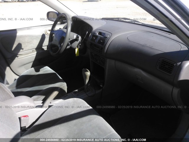 1NXBR12E7XZ203088 - 1999 TOYOTA COROLLA VE/CE/LE 银色 照片 5