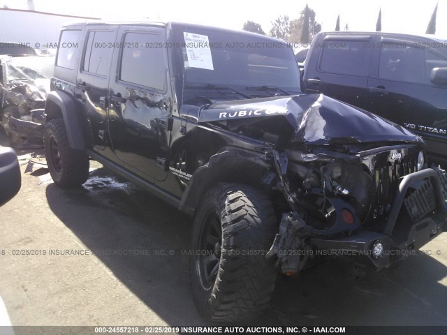 1J4BA6H14BL637183 - 2011 JEEP WRANGLER UNLIMITE RUBICON BLACK photo 1