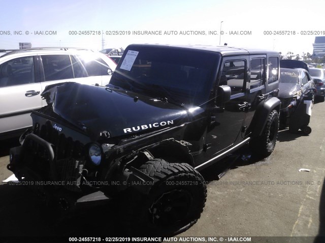 1J4BA6H14BL637183 - 2011 JEEP WRANGLER UNLIMITE RUBICON BLACK photo 2