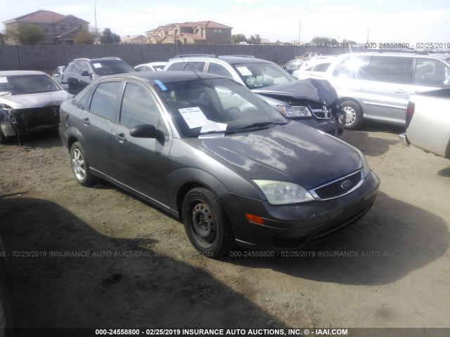 1FAFP34N85W294836 - 2005 FORD FOCUS ZX4 GRAY photo 1