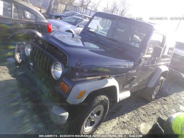 1J4FA29P41P353640 - 2001 JEEP WRANGLER / TJ SE BLUE photo 2