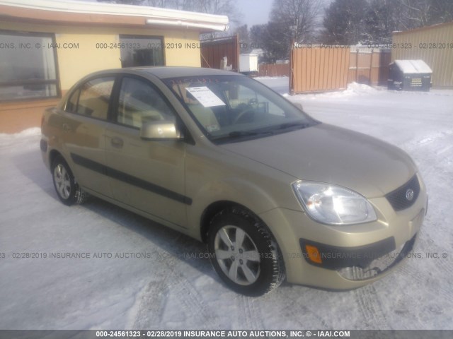 KNADE223196556945 - 2009 KIA RIO LX/SX BROWN photo 1