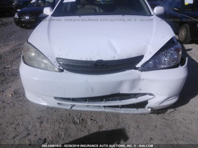 4T1BE32KX4U299632 - 2004 TOYOTA CAMRY LE/XLE/SE WHITE photo 6