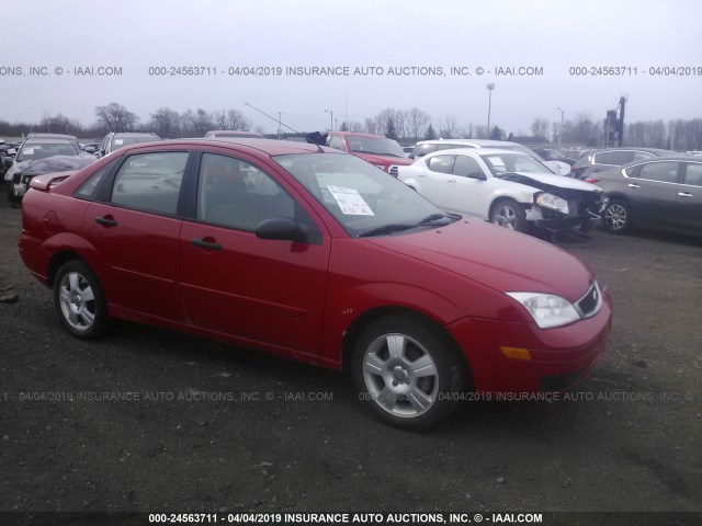 1FAFP34N95W285787 - 2005 FORD FOCUS ZX4 RED photo 1