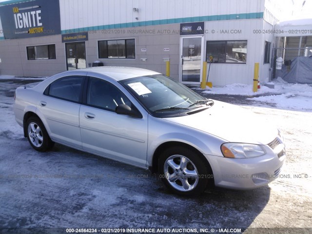 1B3EL56R74N180653 - 2004 DODGE STRATUS ES SILVER photo 1