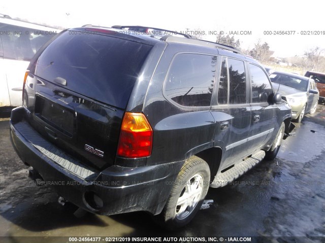 1GKDT13S372245857 - 2007 GMC ENVOY BLACK photo 4