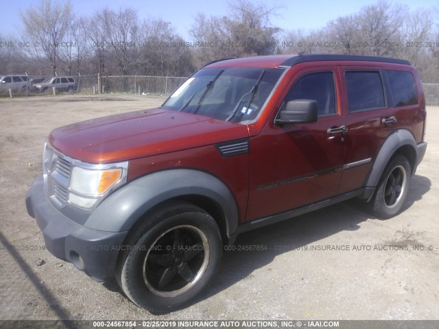 1D8GT28K17W673072 - 2007 DODGE NITRO SXT ORANGE photo 2