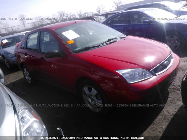 1FAFP34N55W242595 - 2005 FORD FOCUS ZX4 RED photo 1