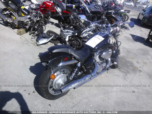 JH2RC534X7M000558 - 2007 HONDA VT750 C2F შავი ფოტო 4