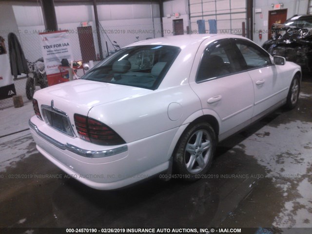 1LNHM87A2YY781813 - 2000 LINCOLN LS WHITE photo 4