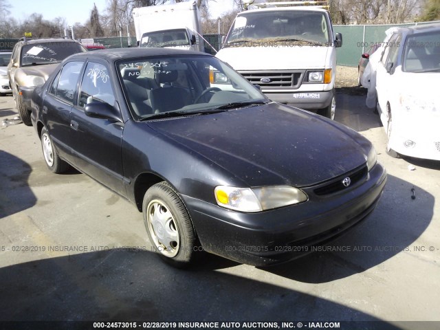 2T1BR12EXXC241819 - 1999 TOYOTA COROLLA VE/CE/LE BLACK photo 1