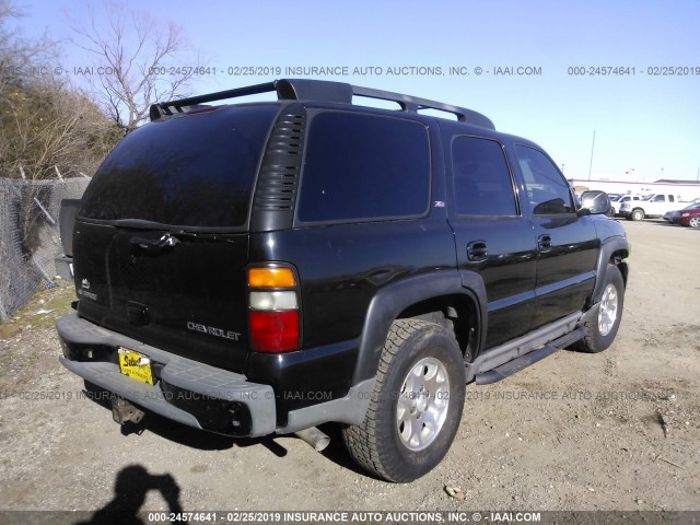 1GNEK13T95R129280 - 2005 CHEVROLET TAHOE K1500 BLACK photo 4